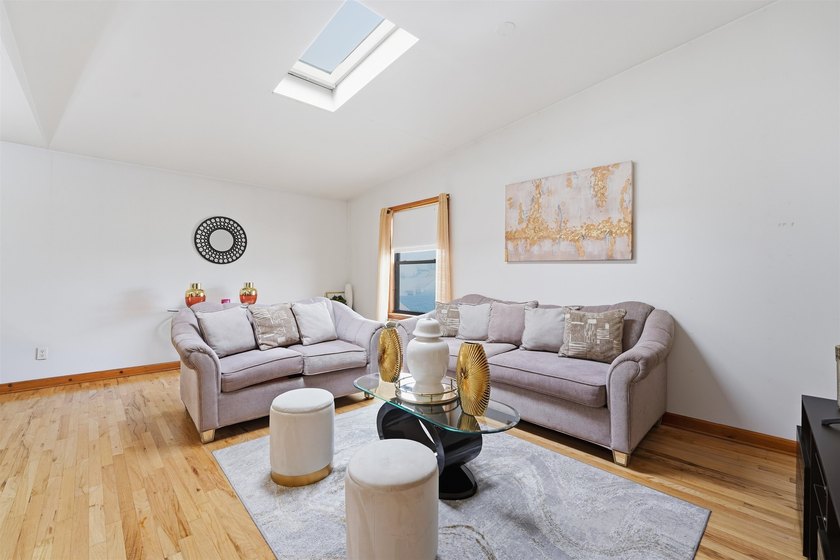 BRIGHT & SPACIOUS 2BR/1.5BA w/PARKING. Enjoy elevated living in - Beach Condo for sale in Guttenberg, New Jersey on Beachhouse.com