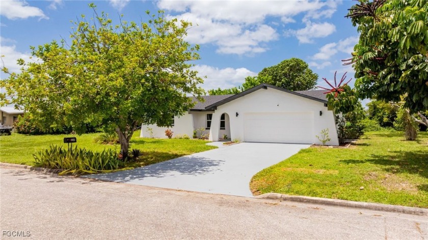 Welcome to this stunning single-story fully renovated home in - Beach Home for sale in Lehigh Acres, Florida on Beachhouse.com