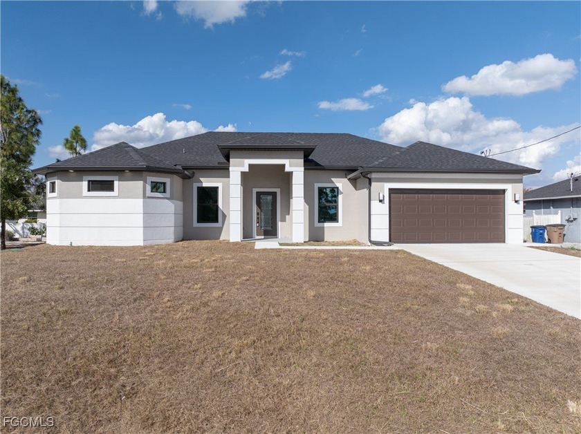 This beautiful new construction home is designed with families - Beach Home for sale in Lehigh Acres, Florida on Beachhouse.com