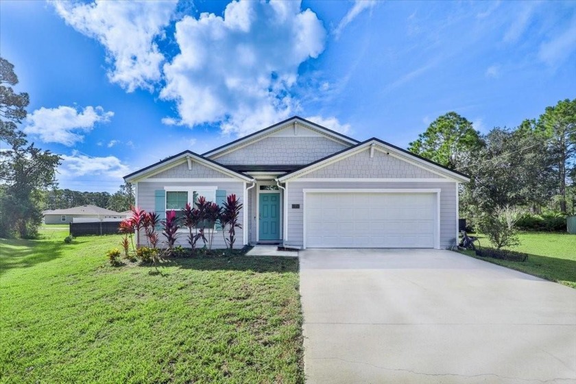 Welcome to this beautiful 4-bedroom, 2-bath home located in - Beach Home for sale in Palm Coast, Florida on Beachhouse.com