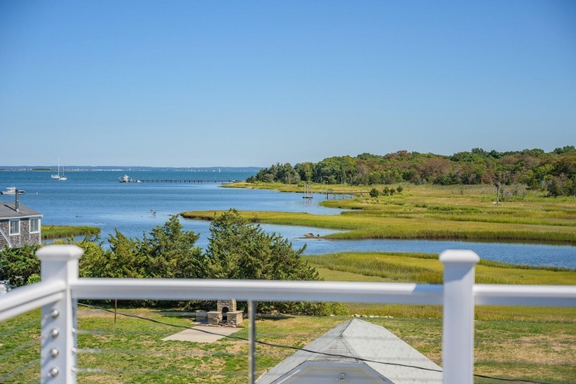 This magnificent coastal retreat is offered fully furnished with - Beach Home for sale in Mattapoisett, Massachusetts on Beachhouse.com