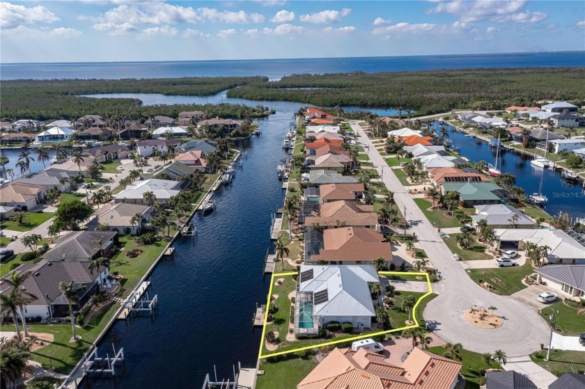 WATERFRONT HOME IN PGI W/**NEW ROOF**  VERY QUICK SAIL ACCESS - Beach Home for sale in Punta Gorda, Florida on Beachhouse.com