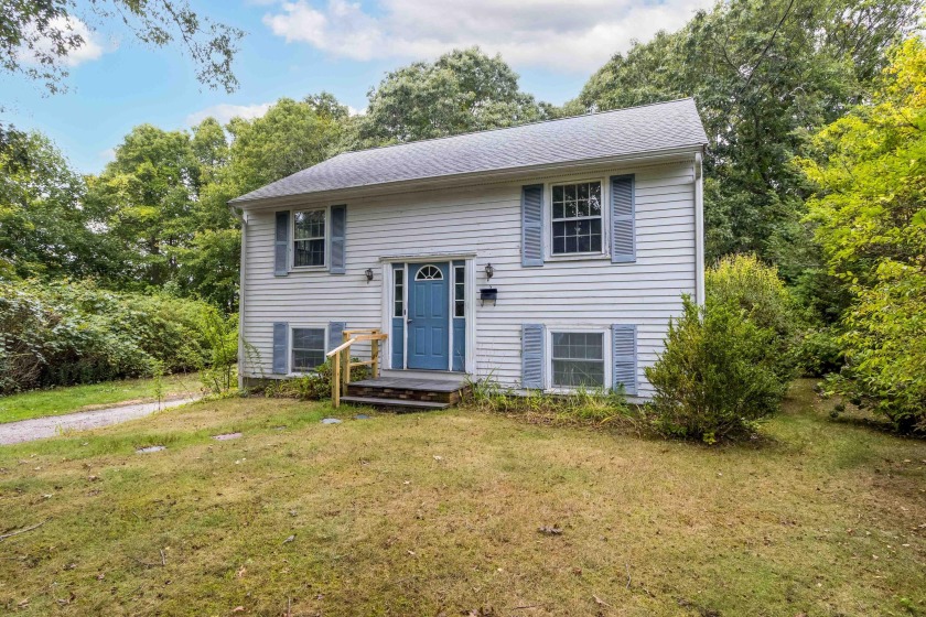 Discover the potential in this 4-bedroom, 2-bath split-level - Beach Home for sale in Teaticket, Massachusetts on Beachhouse.com