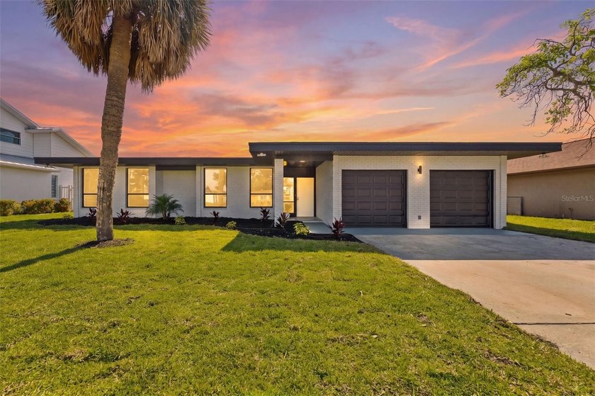 Experience turn-key waterfront living in this beautifully - Beach Home for sale in Tampa, Florida on Beachhouse.com