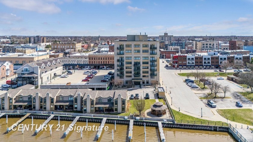 Enjoy condo living in the Historic Jennison Place Building! With - Beach Condo for sale in Bay City, Michigan on Beachhouse.com