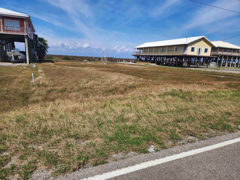 This waterfront vacant lot is 100' wide along the bay & measures - Beach Lot for sale in Grand Isle, Louisiana on Beachhouse.com