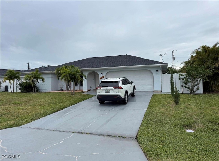 Welcome to this single-family, 3 beds 2 bath home located in the - Beach Home for sale in Cape Coral, Florida on Beachhouse.com