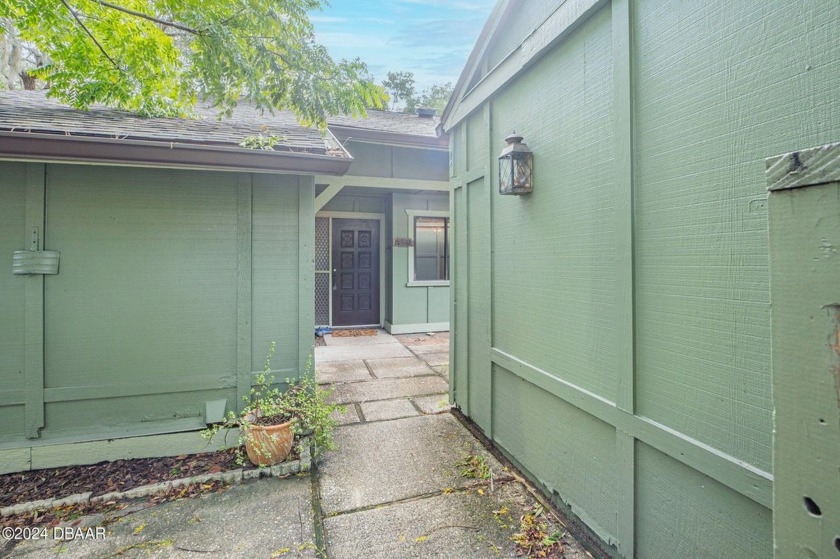 Welcome to this inviting single-family residence nestled in - Beach Home for sale in Ormond Beach, Florida on Beachhouse.com