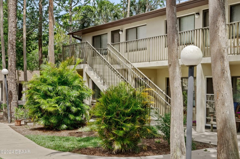 This unique portfolio of two single-family homes and one condo - Beach Commercial for sale in Daytona Beach, Florida on Beachhouse.com