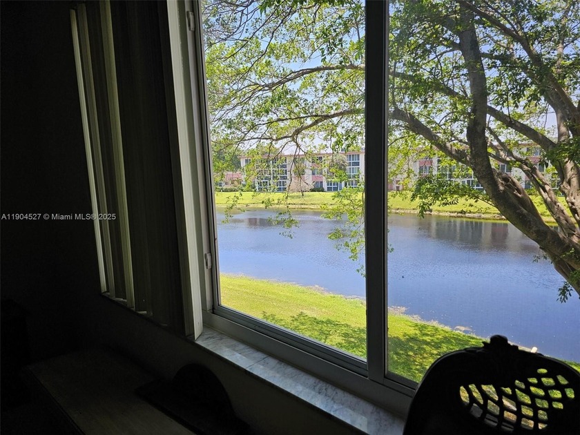 Take in the breathtaking Lake view as you enter this Modernized - Beach Condo for sale in Sunrise, Florida on Beachhouse.com