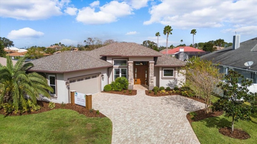 Welcome to a truly groundbreaking, zero-energy masterpiece set - Beach Home for sale in Palm Coast, Florida on Beachhouse.com