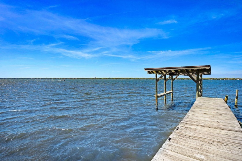 Don't miss this rare opportunity to own a direct Indian River - Beach Home for sale in Merritt Island, Florida on Beachhouse.com