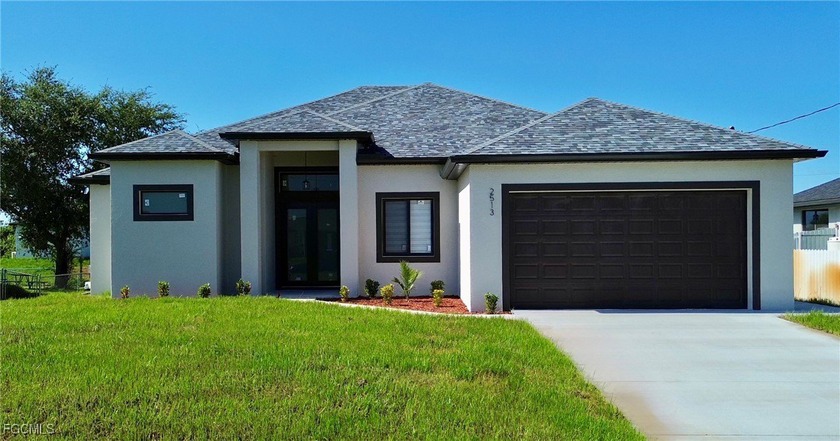 Step into modern comfort and style with this beautifully - Beach Home for sale in Lehigh Acres, Florida on Beachhouse.com