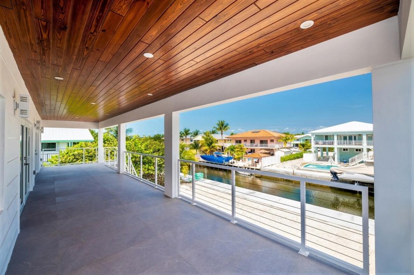 New Contemporary Canal Home perfectly located in the desirable - Beach Home for sale in Key Largo, Florida on Beachhouse.com