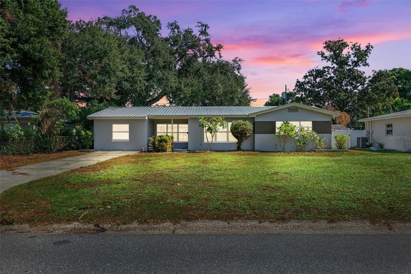 Brand new metal roof was just installed to cap this 3-bedroom - Beach Home for sale in St. Petersburg, Florida on Beachhouse.com