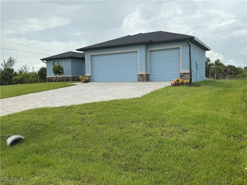 Discover the brand-new Custom Douglas Brooke Home featuring 4 - Beach Home for sale in Cape Coral, Florida on Beachhouse.com