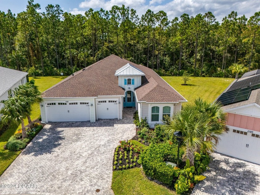 Dreams meet reality in this stunning ARUBA home. Located on a - Beach Home for sale in Daytona Beach, Florida on Beachhouse.com