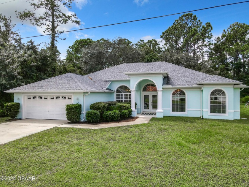 This magnificent home is ready for new owners! Beautiful, custom - Beach Home for sale in Palm Coast, Florida on Beachhouse.com