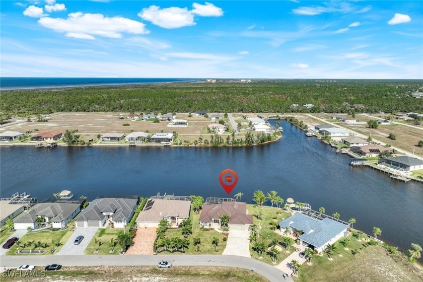 Enjoy SPECTACULAR views of WIDE Quick Silver Lake  3-way - Beach Home for sale in Cape Coral, Florida on Beachhouse.com