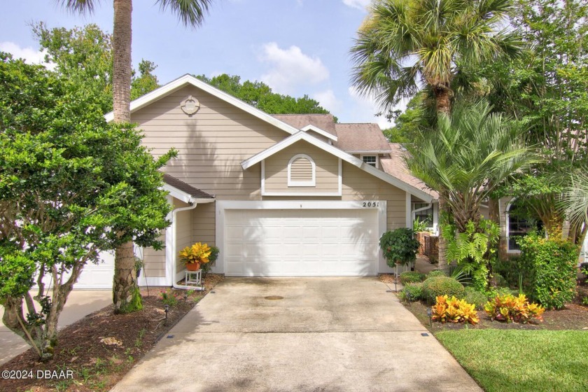 With a private, tranquil water and golf course view, this bright - Beach Condo for sale in Port Orange, Florida on Beachhouse.com