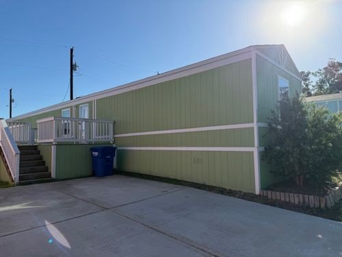 Step into this charming 2022 manufactured home featuring 3 - Beach Home for sale in Beach City, Texas on Beachhouse.com