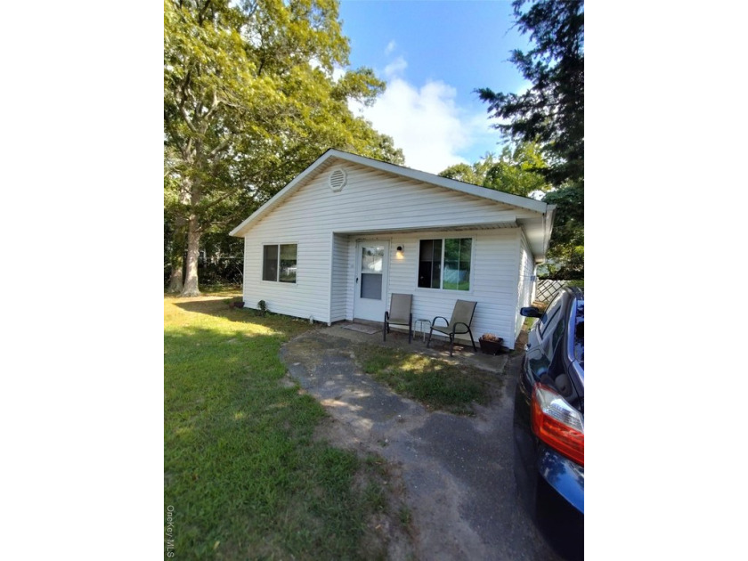 Great starter home! Maintenance free exterior on quiet tree - Beach Home for sale in Shirley, New York on Beachhouse.com