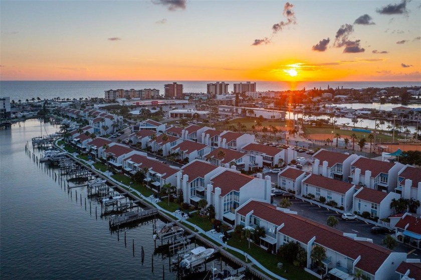 Discover coastal living in this charming 2-bedroom condo in - Beach Condo for sale in Madeira Beach, Florida on Beachhouse.com