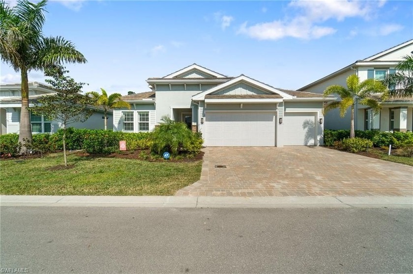 Discover this beautifully upgraded 4-bedroom + den home with 4 - Beach Home for sale in Bonita Springs, Florida on Beachhouse.com