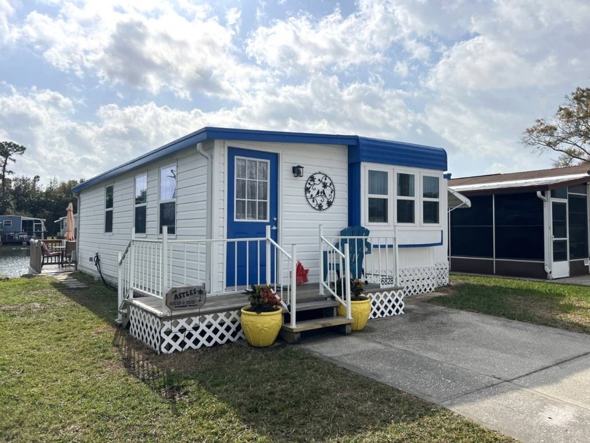 This is a PRISTINE 2-Bedroom, 1-Bathroom FULLY FURNISHED Park - Beach Home for sale in Port Richey, Florida on Beachhouse.com