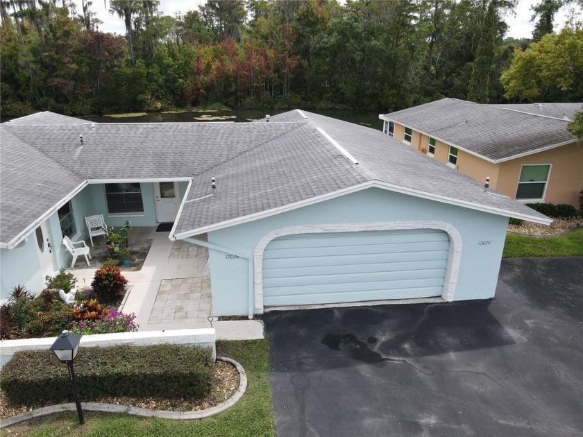 What a view! Come see this 1 bed, 1.5 bath home located on lake - Beach Condo for sale in New Port Richey, Florida on Beachhouse.com