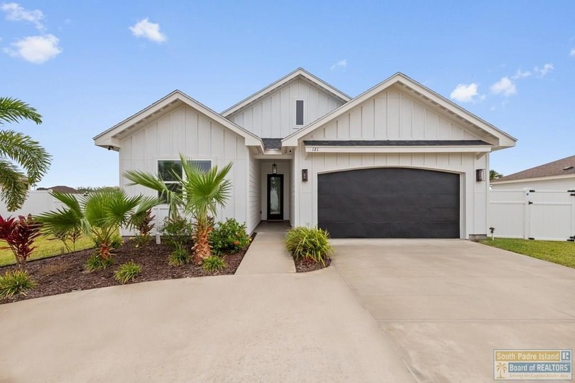 This custom-built residence showcases a refined coastal modern - Beach Home for sale in Laguna Vista, Texas on Beachhouse.com