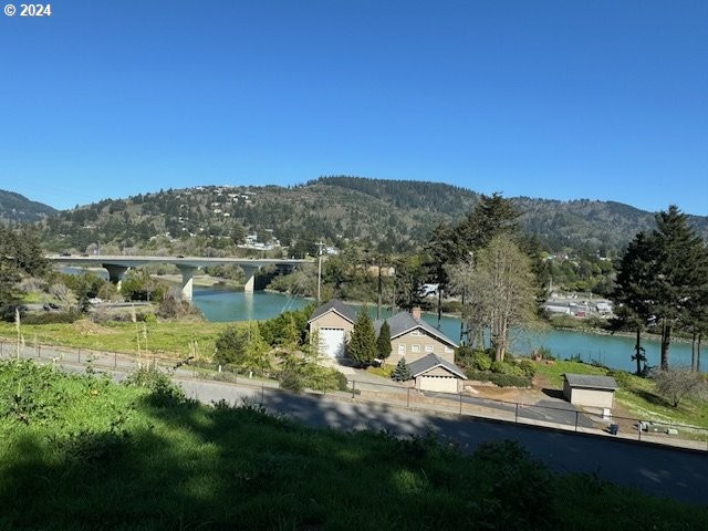 This building site offers INCREDIBLE views of THE CHETCO RIVER - Beach Lot for sale in Brookings, Oregon on Beachhouse.com