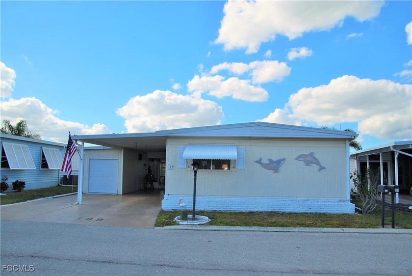 Set directly along the fairway in Six Lakes Country Club, this - Beach Home for sale in North Fort Myers, Florida on Beachhouse.com