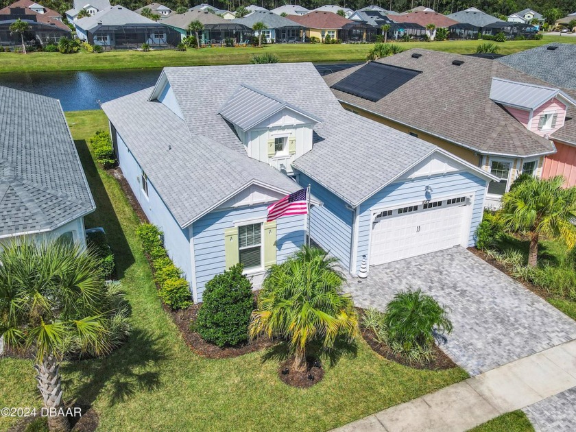 Beautiful Coconut on amazing water lot! Home has impact glass on - Beach Home for sale in Daytona Beach, Florida on Beachhouse.com