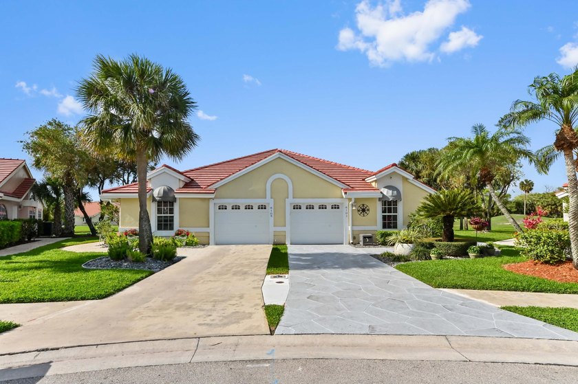 Welcome to this charming lakefront home located in the desirable - Beach Home for sale in Greenacres, Florida on Beachhouse.com