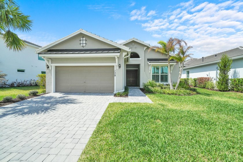 Located in the premier gated golf community of Tesoro Club, this - Beach Home for sale in Port Saint Lucie, Florida on Beachhouse.com