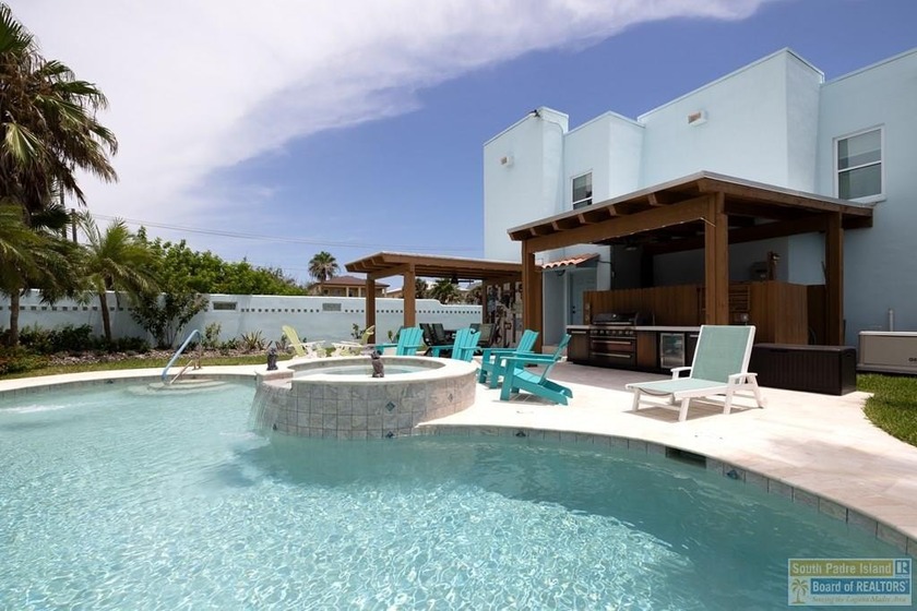 Welcome to 5907 Tropical Blvd, a stunning Santa Fe-style 2-story - Beach Home for sale in South Padre Island, Texas on Beachhouse.com