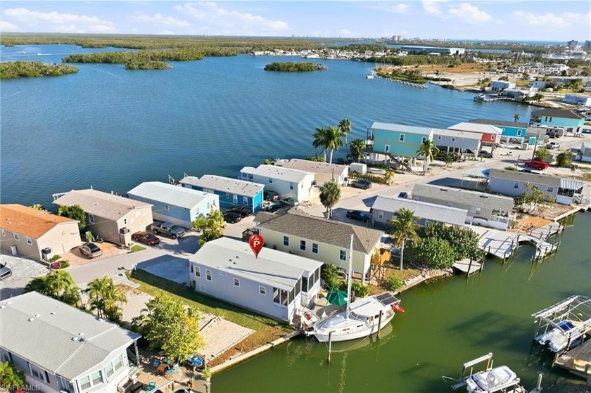 Welcome to a beautifully updated coastal retreat offering direct - Beach Home for sale in Fort Myers Beach, Florida on Beachhouse.com