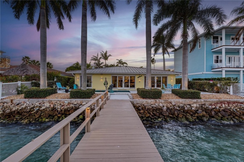Imagine a picturesque scene where a well-maintained open concept - Beach Home for sale in Treasure Island, Florida on Beachhouse.com