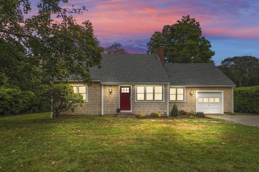 Discover this beautifully renovated Cape Cod-style home set on - Beach Home for sale in Falmouth, Massachusetts on Beachhouse.com