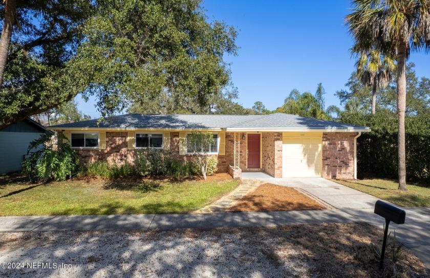 This delightful beach bungalow features freshly updated exterior - Beach Home for sale in Jacksonville Beach, Florida on Beachhouse.com