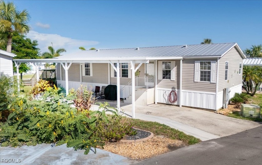 WATERFRONT-LAND OWNERSHIP-NO LOT RENT Don't miss this rare - Beach Home for sale in Punta Gorda, Florida on Beachhouse.com