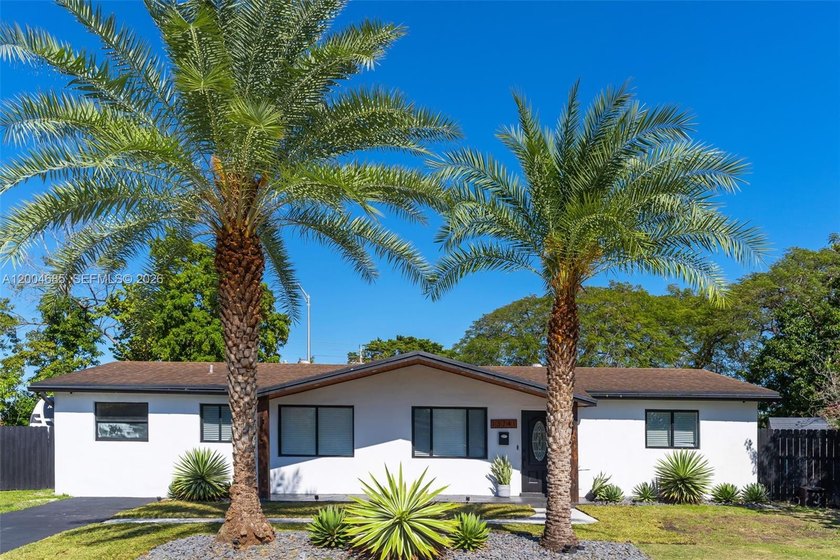 This exceptional 4-bedroom, 2-bath home sits on a rare oversized - Beach Home for sale in Miami, Florida on Beachhouse.com
