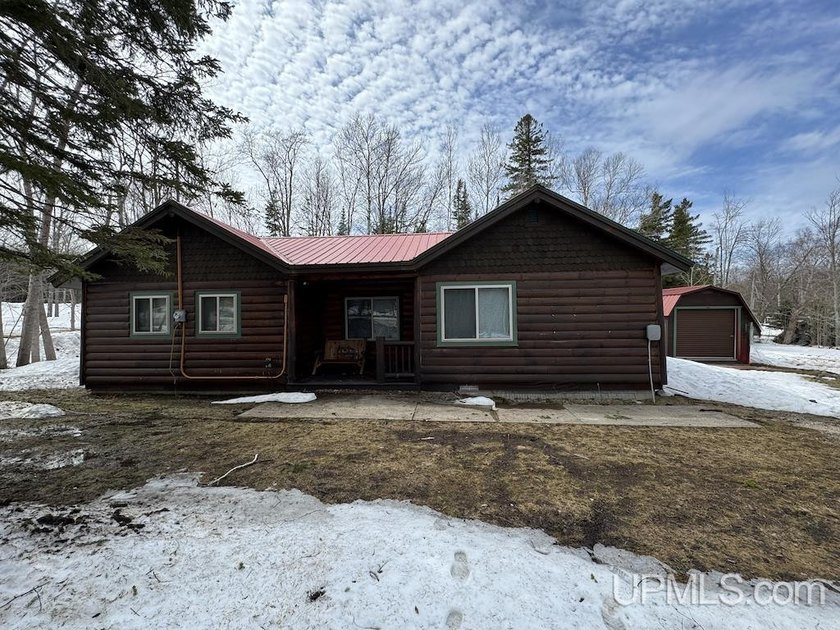 Come check out this gem of a log cabin about a mile from town! - Beach Home for sale in Grand Marais, Michigan on Beachhouse.com