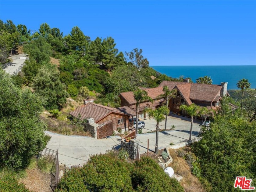 Situated in the hills above Malibu, this private 2.42-acre - Beach Home for sale in Malibu, California on Beachhouse.com