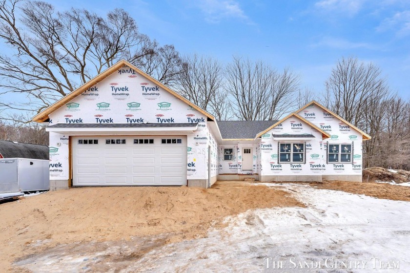 This beautiful new construction ranch sits on 1.5 acres and - Beach Home for sale in Norton Shores, Michigan on Beachhouse.com