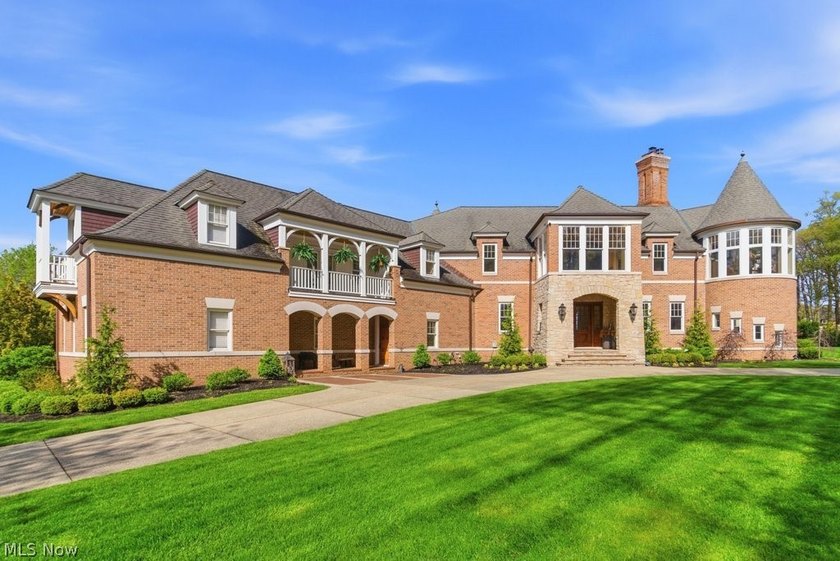 Set within a private gated street in Bratenahl, this - Beach Home for sale in Bratenahl, Ohio on Beachhouse.com