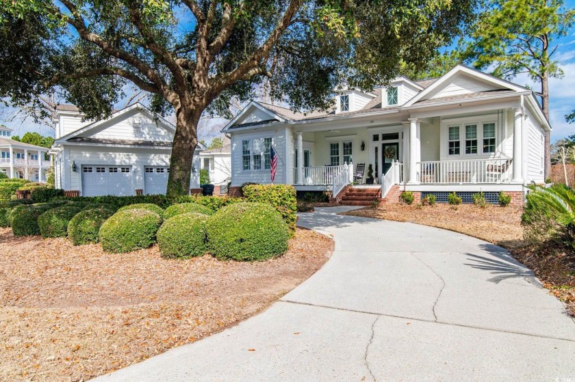 Welcome to this stunning lakefront home located in the highly - Beach Home for sale in Pawleys Island, South Carolina on Beachhouse.com