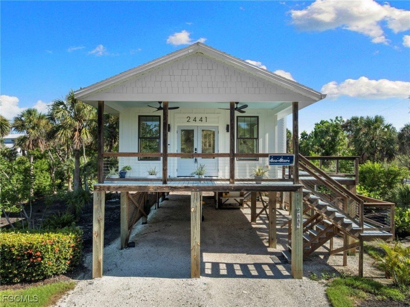 Experience coastal living at its finest in this stunning - Beach Home for sale in Sanibel, Florida on Beachhouse.com