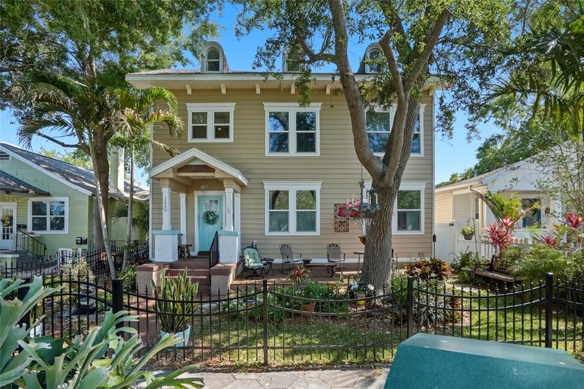 Welcome to this beautifully updated 1910 Colonial home, nestled - Beach Home for sale in St. Petersburg, Florida on Beachhouse.com